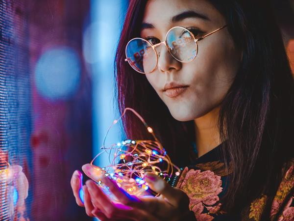 Girl holding lights